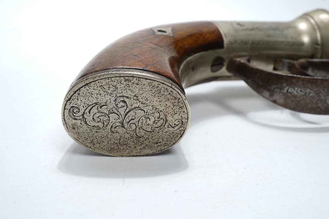 A six shot 120 bore self-cocking percussion pepperbox revolver with fluted barrels, Birmingham proof, rounded foliate engraved frame with ‘Improved Revolver’, and two-piece walnut grips